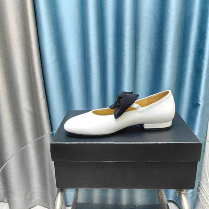 MARY JANE SHOES WHITE SHEEPSKIN WITH BLACK BOW