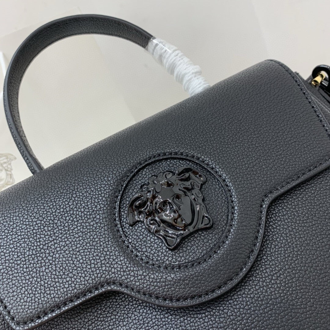 Versace La Medusa medium top handle bag in black grained leather