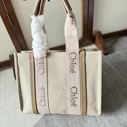MEDIUM WOODY TOTE BAG 37 IN BEIGE LINEN CANVAS LIGHT PINK WEBBING LOGO EMBROIDERY