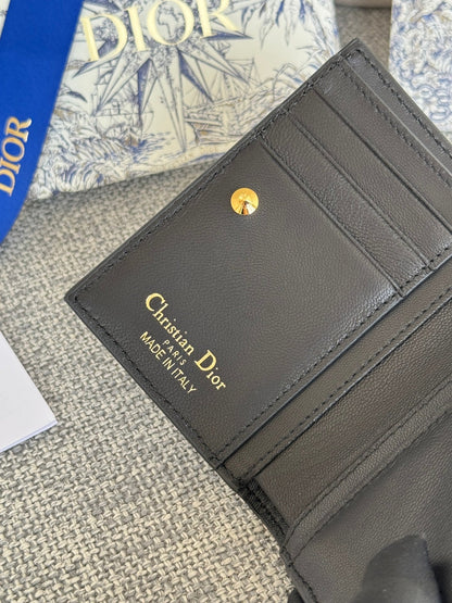 BIFOLD WALLET 11 IN BLACK QUILTED ALLOVER CALFSKIN