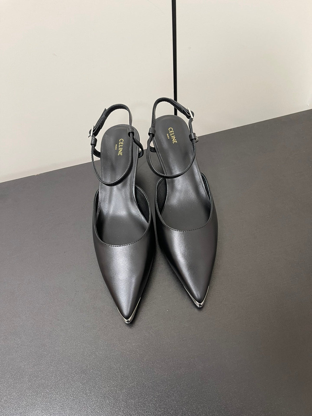 MORRAINE SLINGBACK PUMPS IN BLACK CALFSKIN