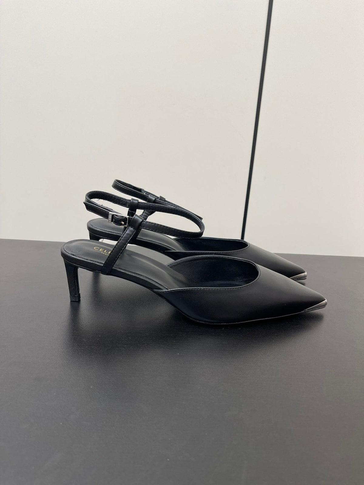 MORRAINE SLINGBACK PUMPS IN BLACK CALFSKIN