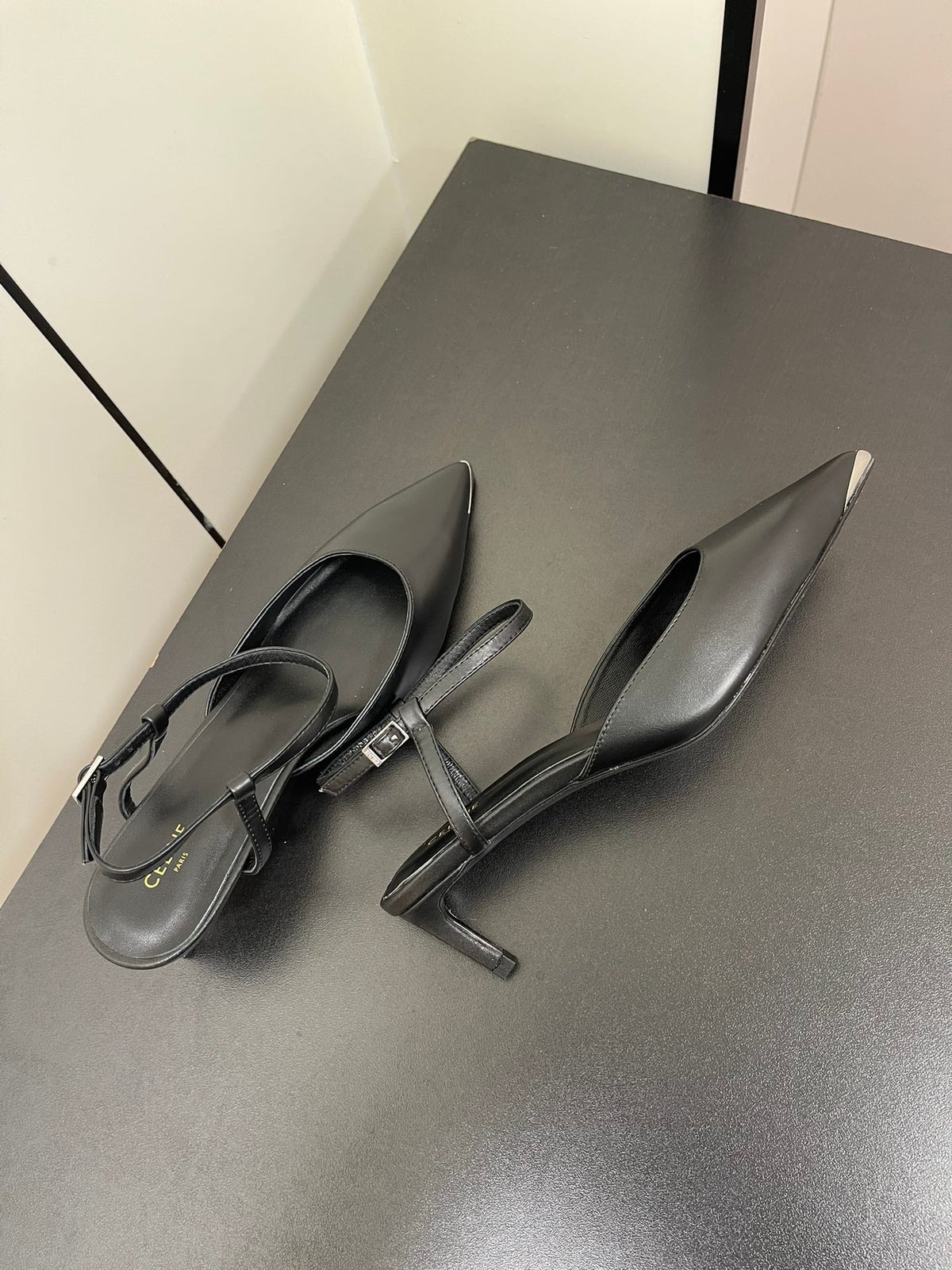 MORRAINE SLINGBACK PUMPS IN BLACK CALFSKIN