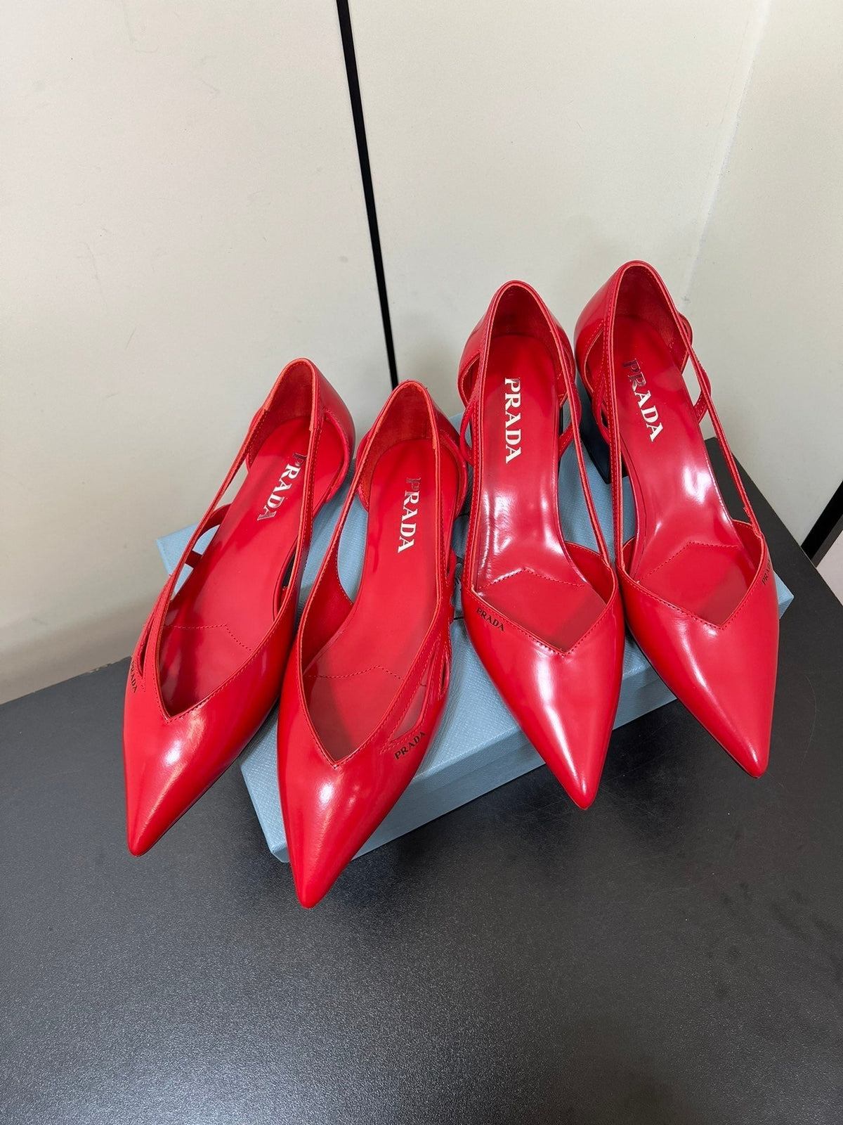 BRUSHED CUT-OUT PUMPS IN RED CALFSKIN