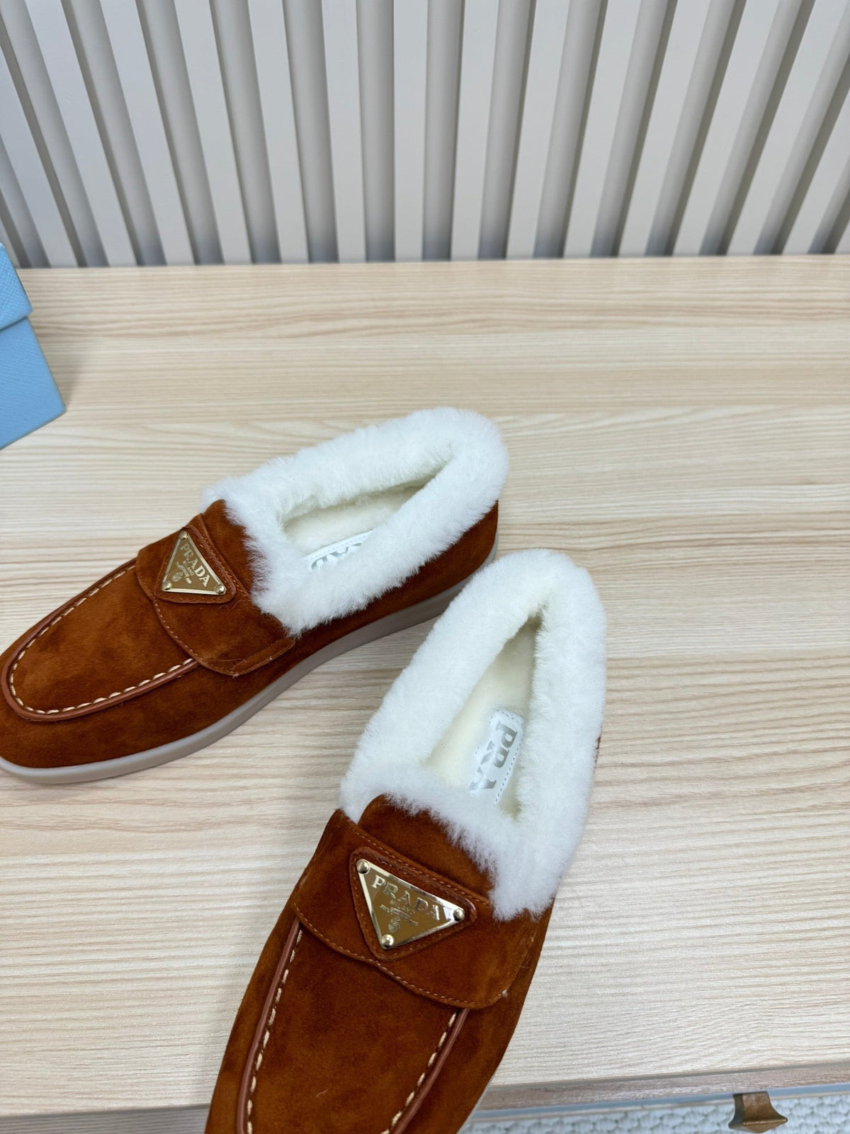 LOAFER IN RED BROWN SUEDE AND FUR LINING ATTACHED TRIANGLE LOGO