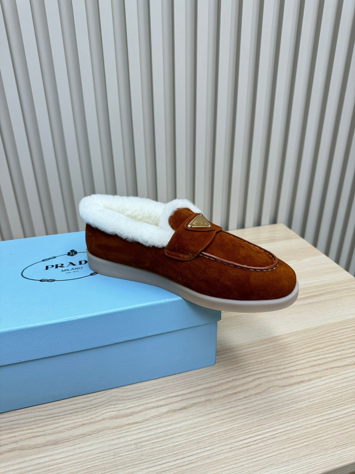 LOAFER IN RED BROWN SUEDE AND FUR LINING ATTACHED TRIANGLE LOGO