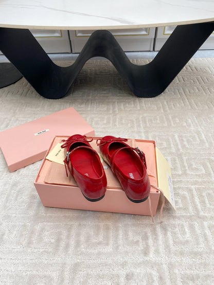 BOW MARY JANE FLAT IN RED NAPLAK LAMBSKIN