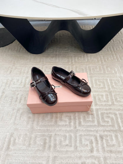 BOW MARY JANE FLAT IN ESPRESSO NAPLAK LAMBSKIN