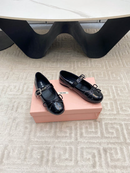 BOW MARY JANE FLAT IN BLACK NAPLAK LAMBSKIN