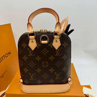 Louis Vuitton Alma backpack in the signature brown monogram canvas