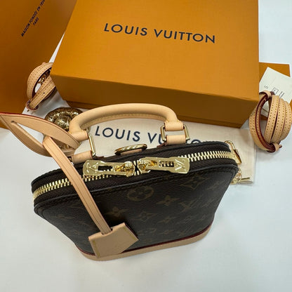 Louis Vuitton Alma backpack in the signature brown monogram canvas