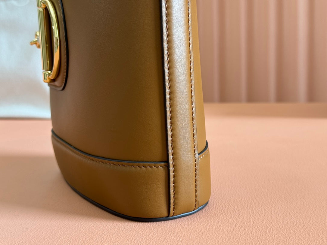 73 SMALL BUCKET BAG 20 IN BROWN SMOOTH CALFSKIN
