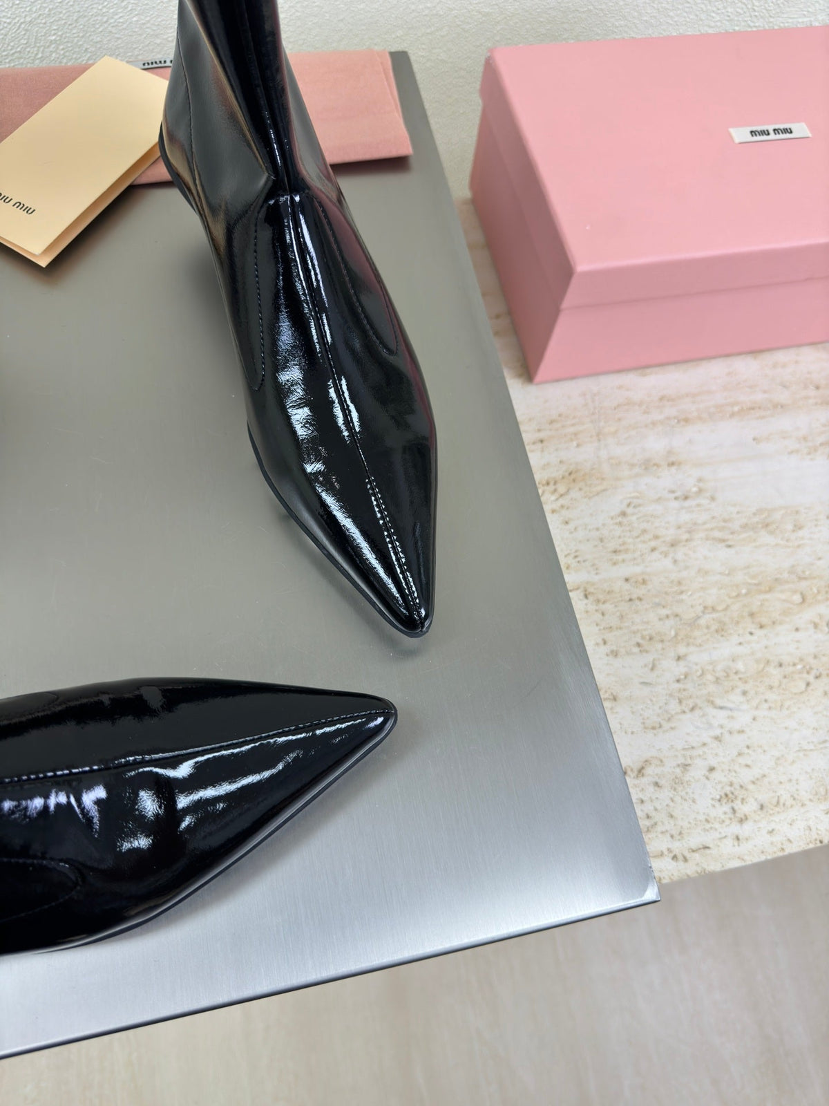ANKLE POINTED-TOE BOOTS IN BLACK GLOSSY CALFSKIN