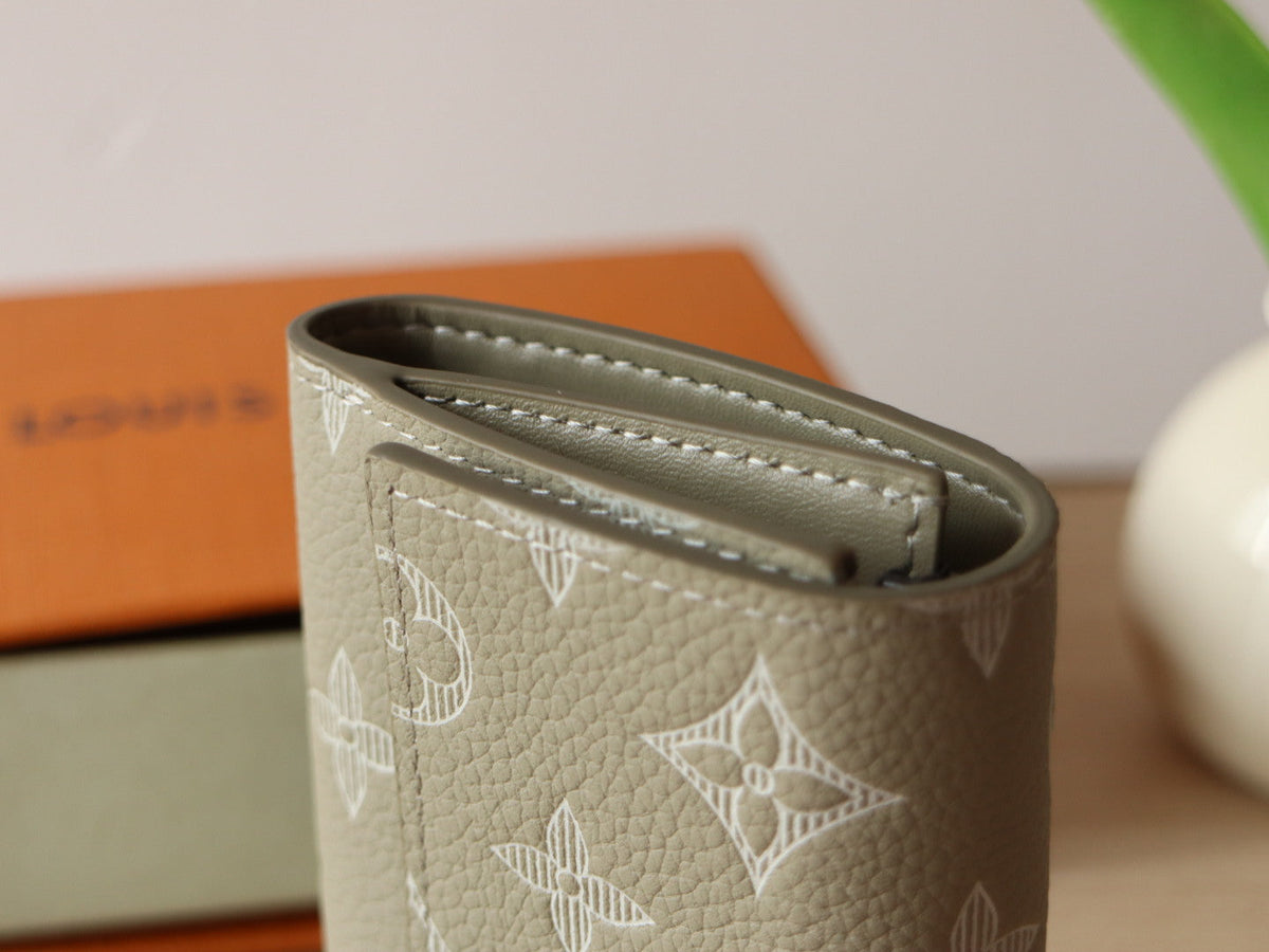 IRIS WALLET IN KHAKI BROWN EMBOSSED CALFSKIN