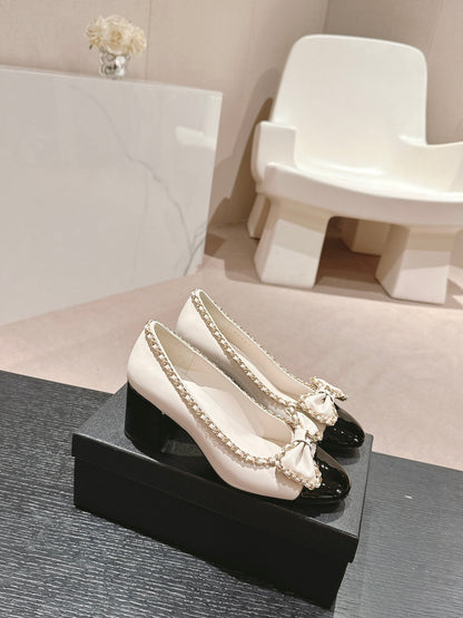 BOWKNOT HIGH HEELS IN WHITE MIX BLACK SHEEPSKIN