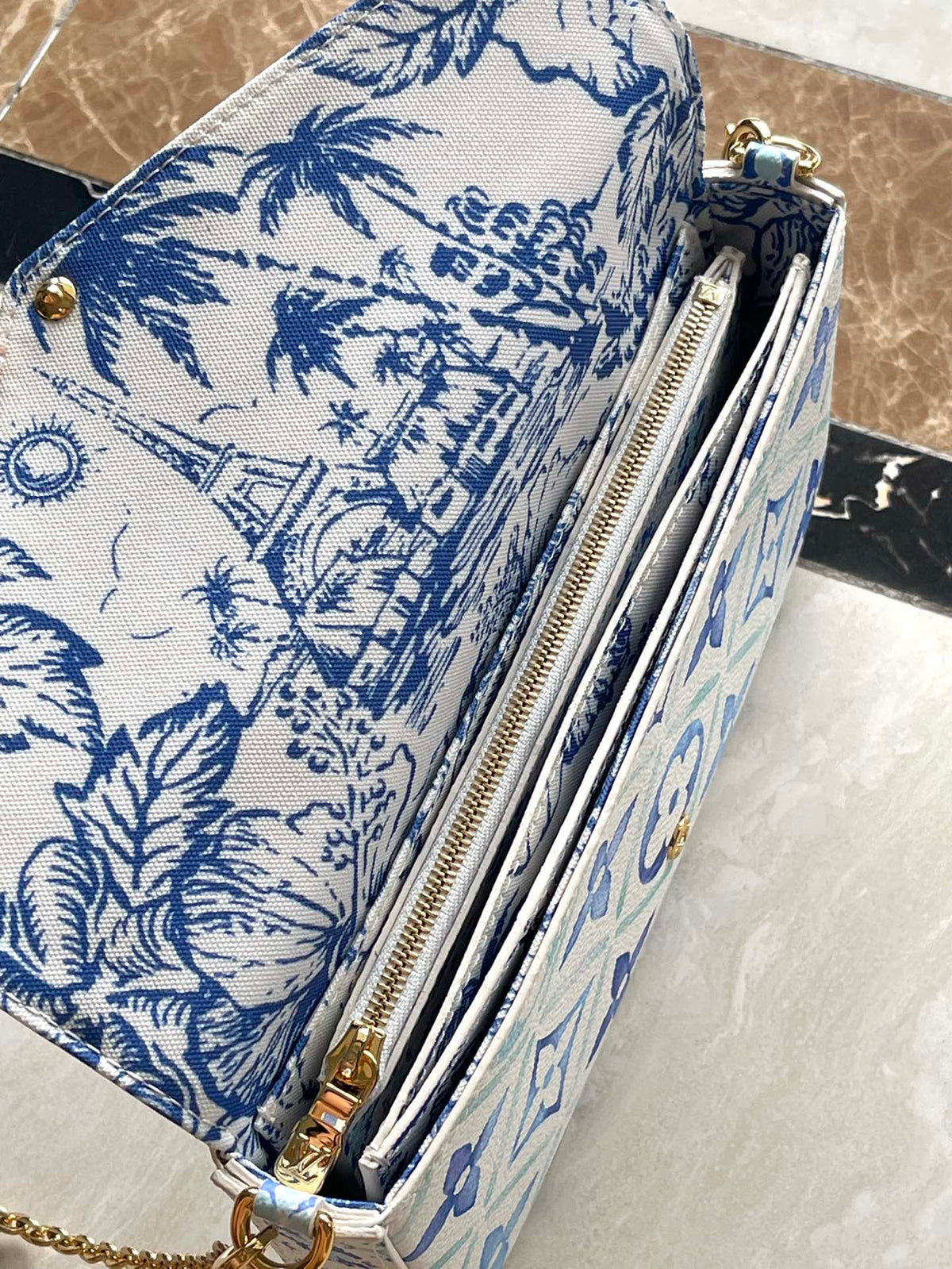 FÉLICIE POCHETTE 21 IN LAGOON BLUE MONOGRAM TILES CANVAS