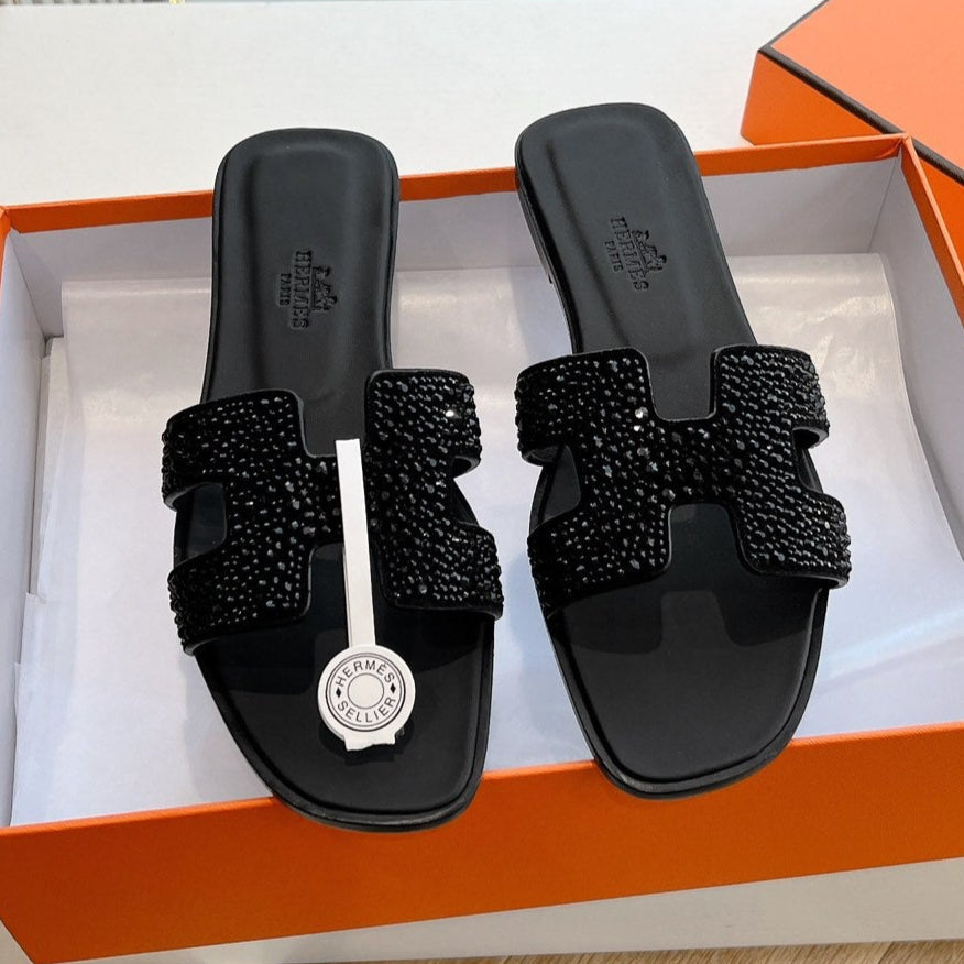 0RAN SLIDE IN BLACK CALFSKIN WITH CRYSTALS