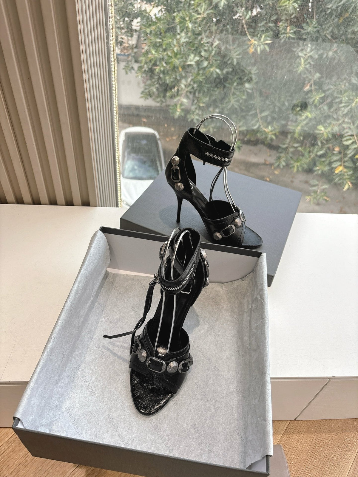 CAGOLE HIGH-HEEL SANDALS IN BLACK LAMBSKIN