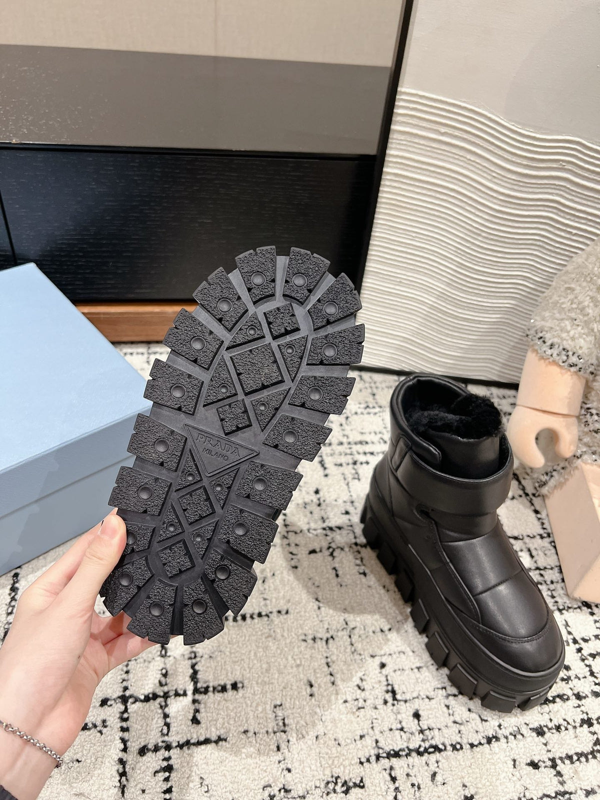 MONOLITH ANKLE BOOTS WITH STRAP IN BLACK CALFSKIN AND FLEECE LINING