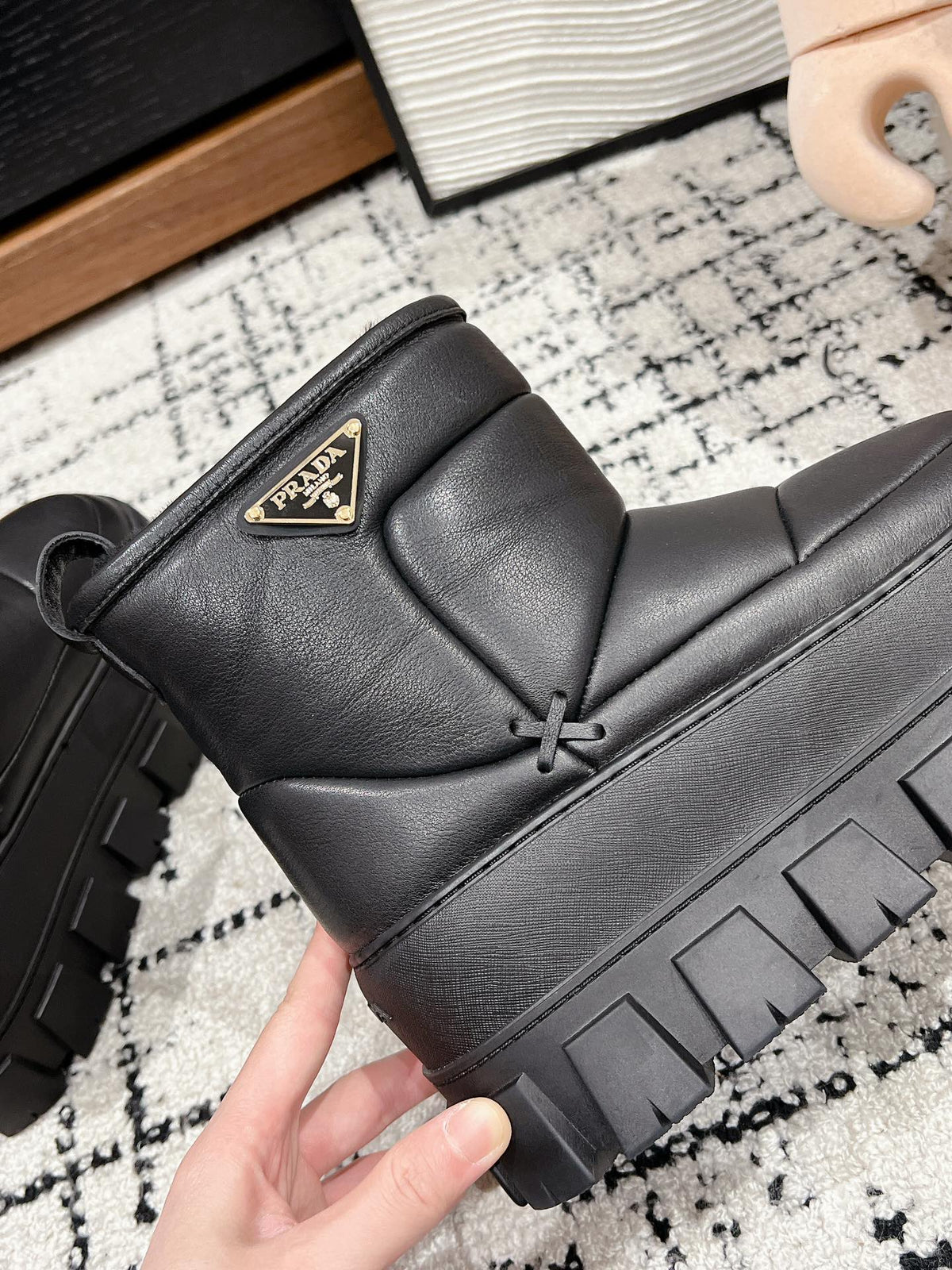 MONOLITH ANKLE BOOTS IN BLACK CALFSKIN AND LAMB FUR LINING