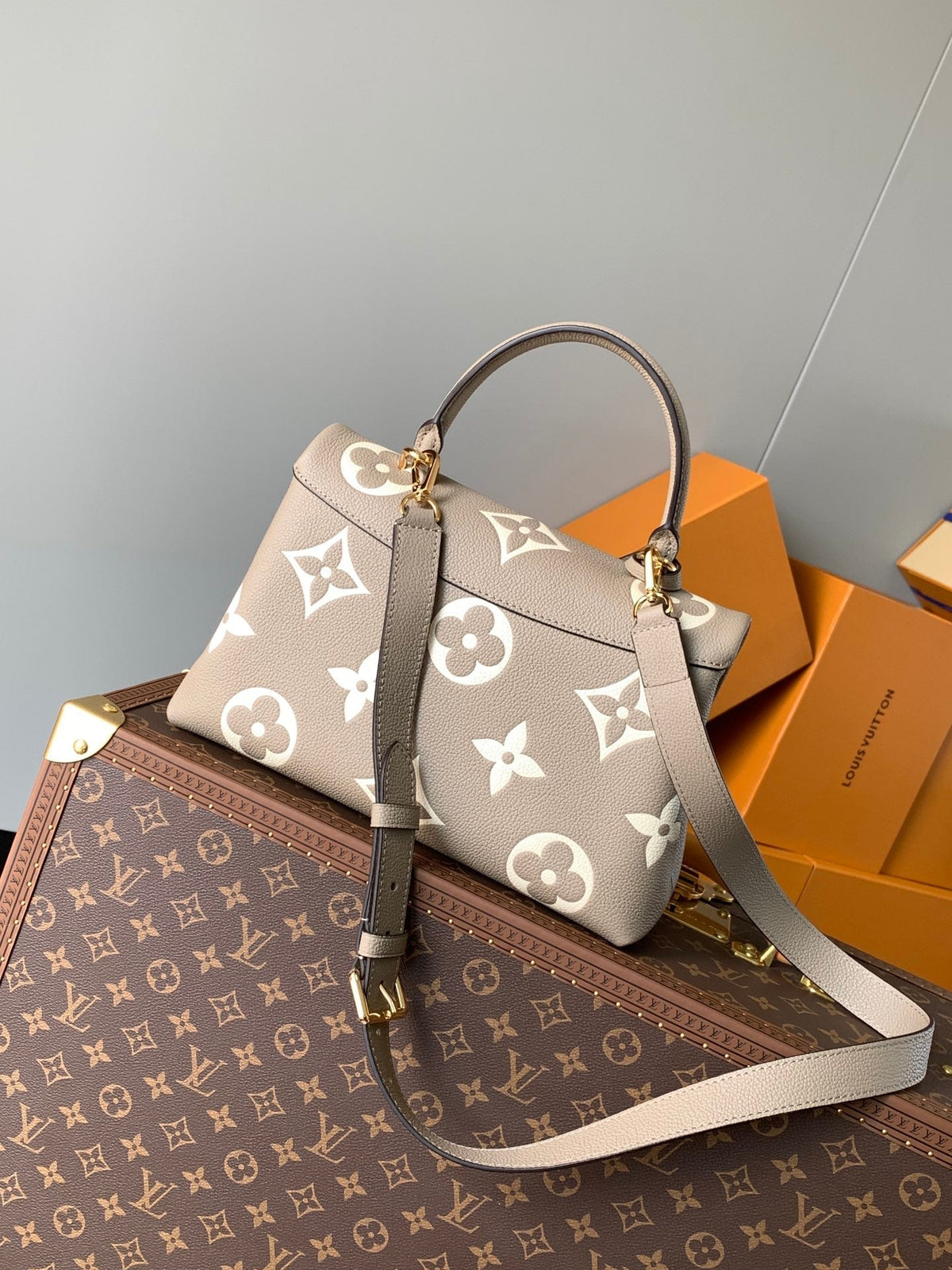 LV MADELEINE 30 IN BEIGE MONOGRAM CALFSKIN EMBOSSED LOGO