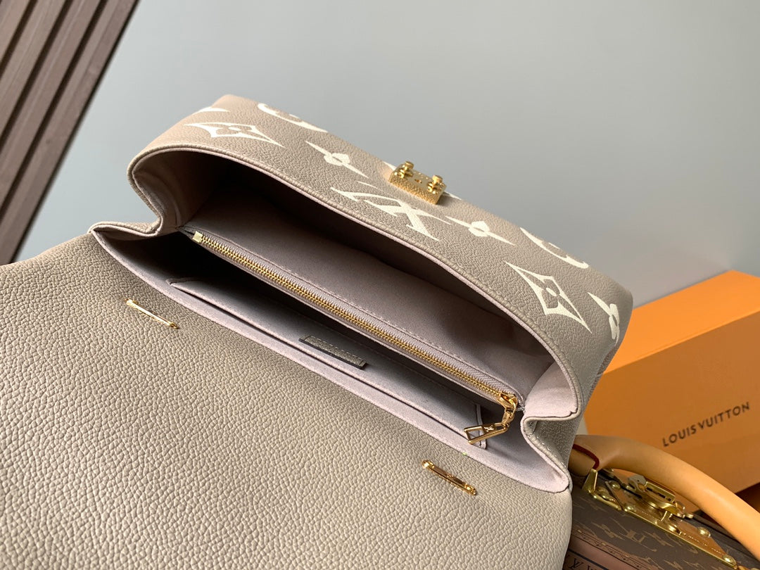 LV MADELEINE 30 IN BEIGE MONOGRAM CALFSKIN EMBOSSED LOGO