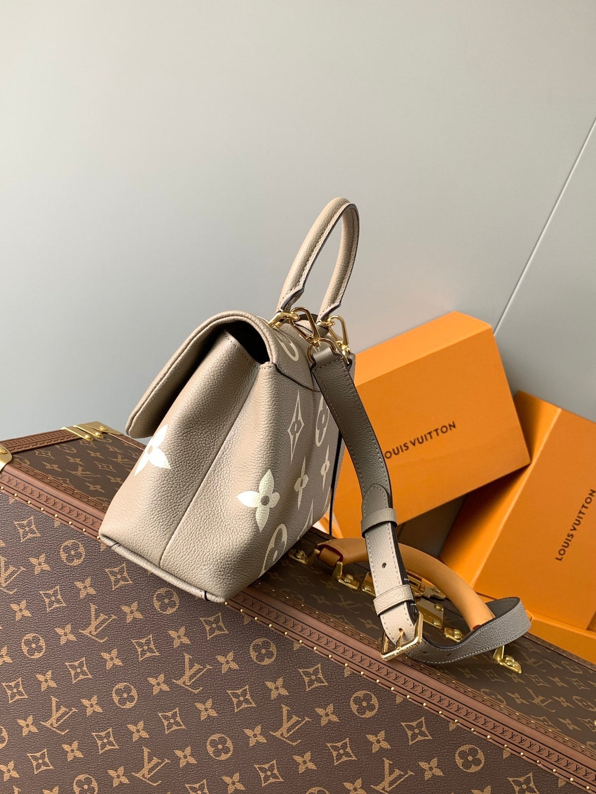 LV MADELEINE 30 IN BEIGE MONOGRAM CALFSKIN EMBOSSED LOGO