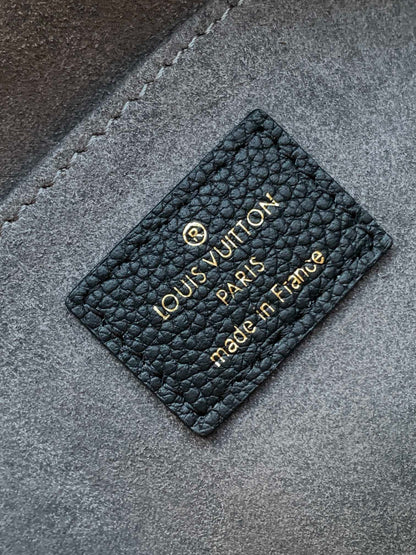 LV MADELEINE 30 IN BLACK MIX WHITE MONOGRAM CALFSKIN EMBOSSED LOGO