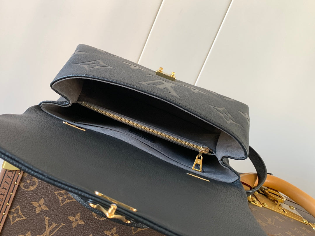 LV MADELEINE 30 IN BLACK MIX WHITE MONOGRAM CALFSKIN EMBOSSED LOGO