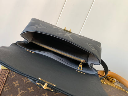 LV MADELEINE 30 IN BLACK MIX WHITE MONOGRAM CALFSKIN EMBOSSED LOGO