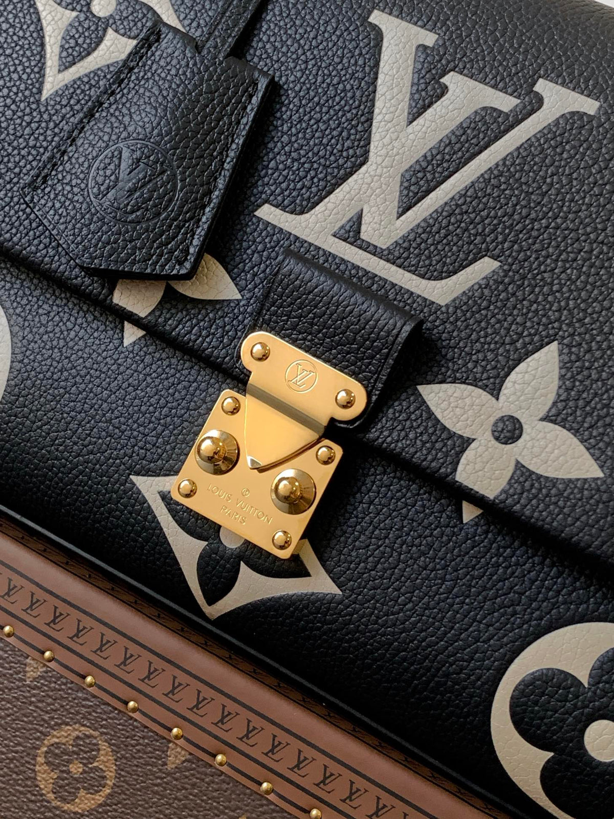 LV MADELEINE 30 IN BLACK MIX WHITE MONOGRAM CALFSKIN EMBOSSED LOGO