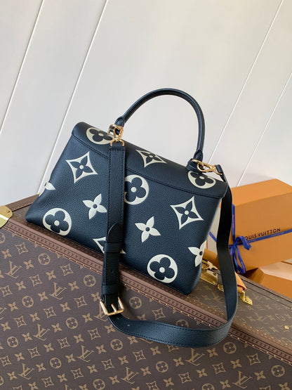 LV MADELEINE 30 IN BLACK MIX WHITE MONOGRAM CALFSKIN EMBOSSED LOGO