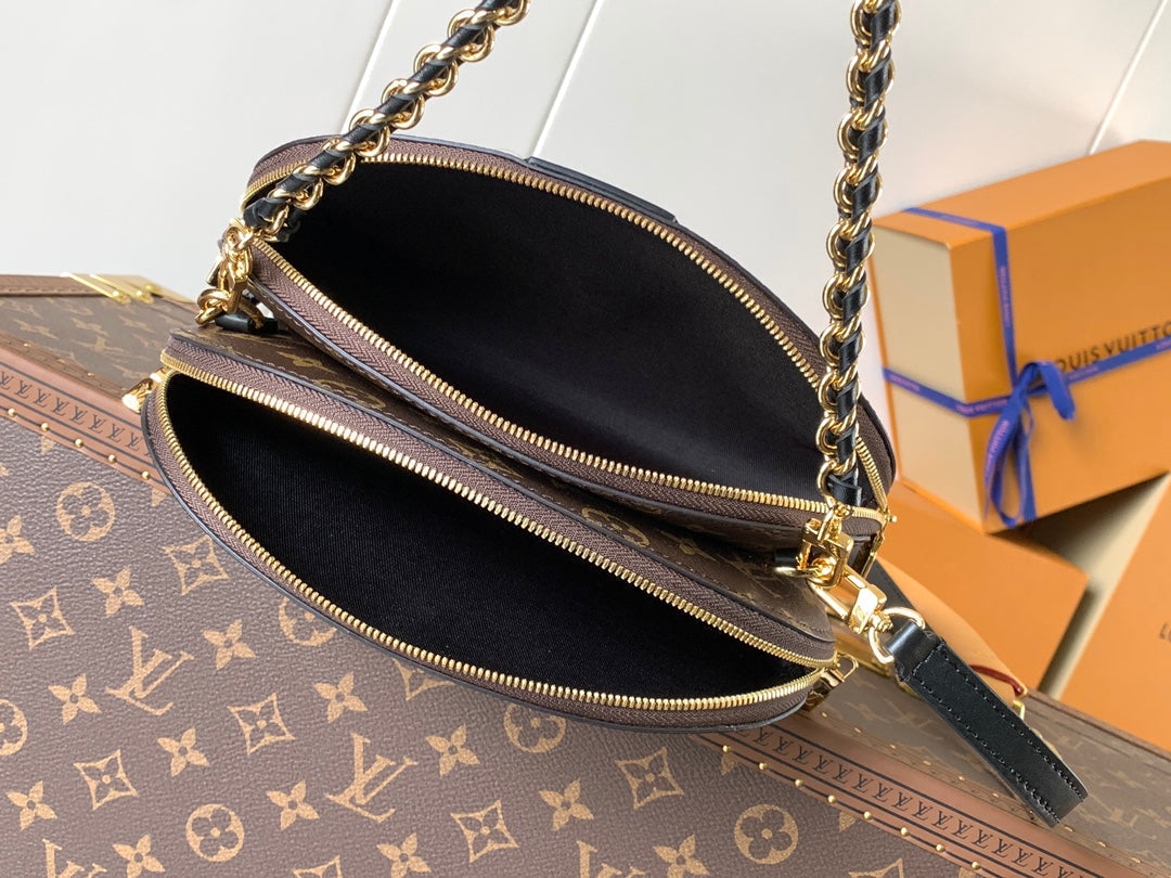 ALMA BE BAG 27 IN BROWN MONOGRAM CANVAS AND COWHIDE