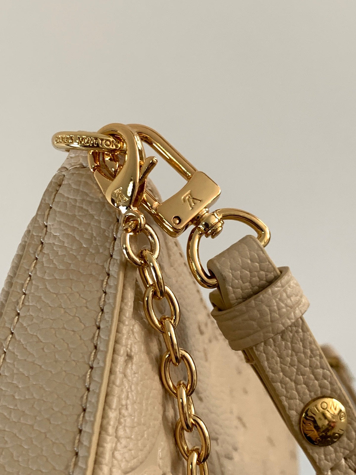 LV EASY POUCH ON STRAP 19 IN BEIGE MONOGRAM EMPREINTE LEATHER