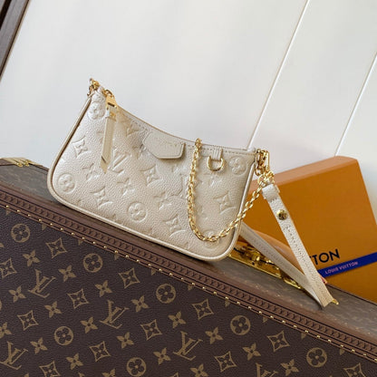 LV EASY POUCH ON STRAP 19 IN BEIGE MONOGRAM EMPREINTE LEATHER