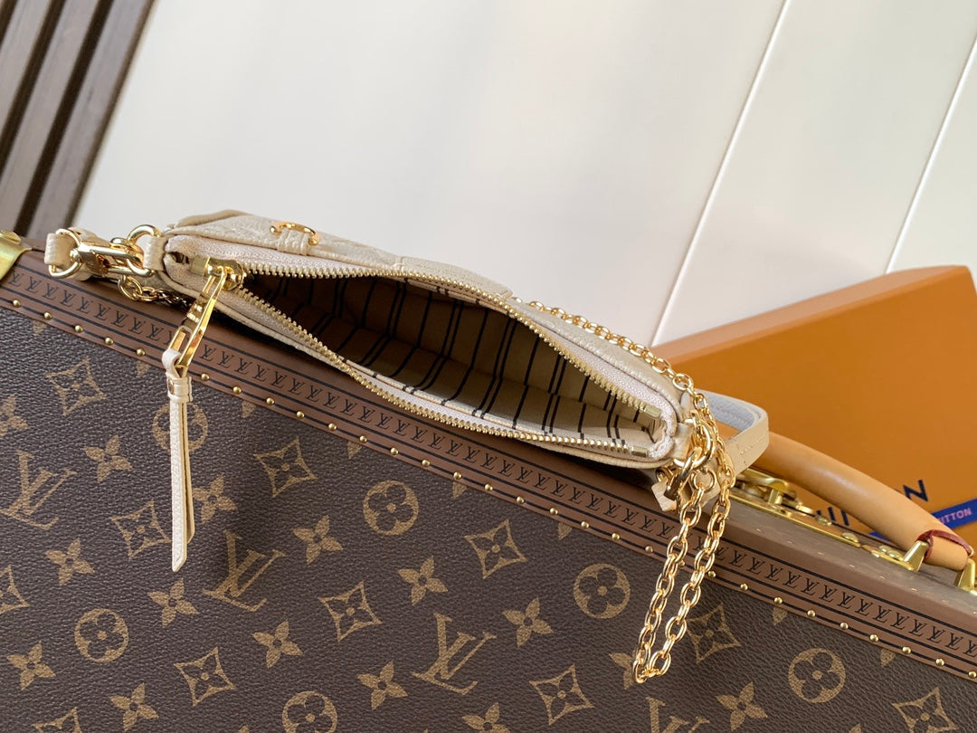 LV EASY POUCH ON STRAP 19 IN BEIGE MONOGRAM EMPREINTE LEATHER