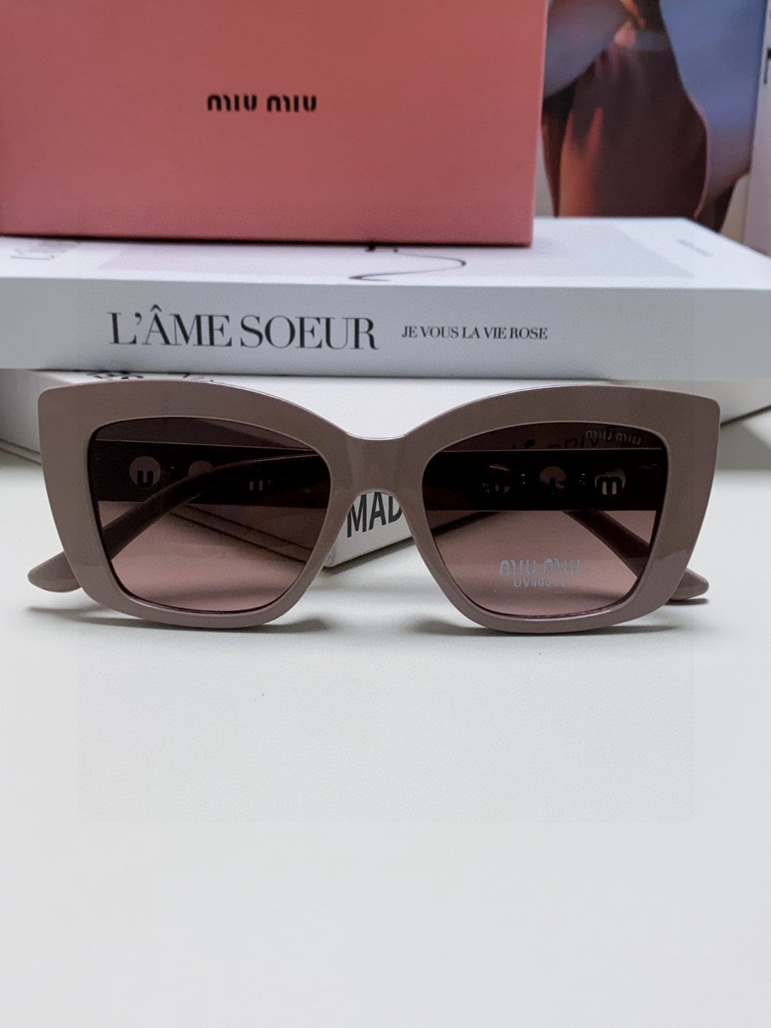 LOGO CAT EYE SUNGLASSES 513003 IN NUDE ACETATE
