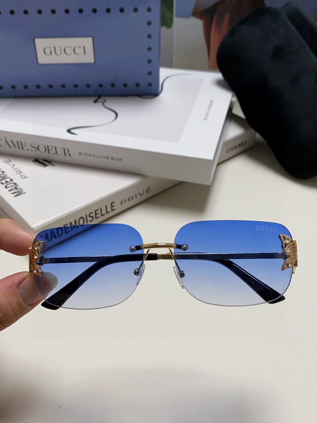 BUTTERFLY EMBELLISHED RIMLESS RECTANGULAR FRAME SUNGLASSES 570245 IN METAL