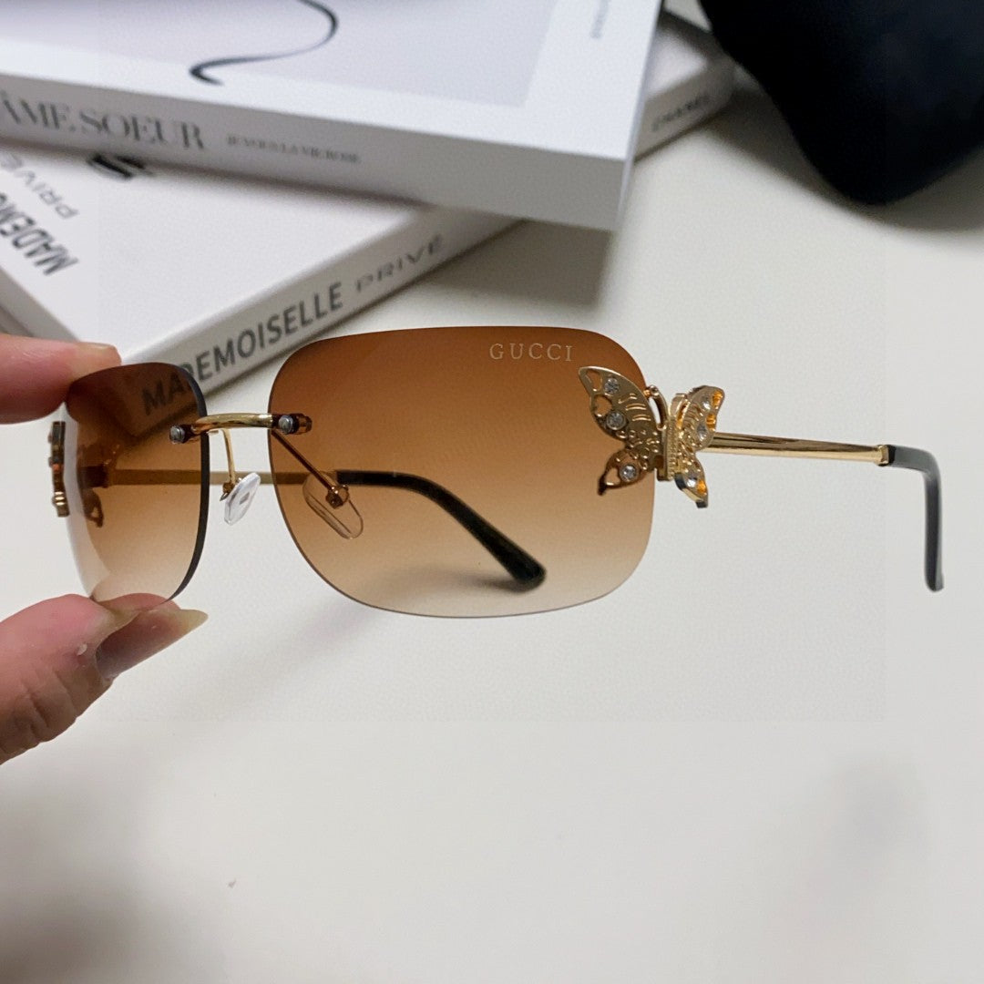 BUTTERFLY EMBELLISHED RIMLESS RECTANGULAR FRAME SUNGLASSES 570245 IN METAL