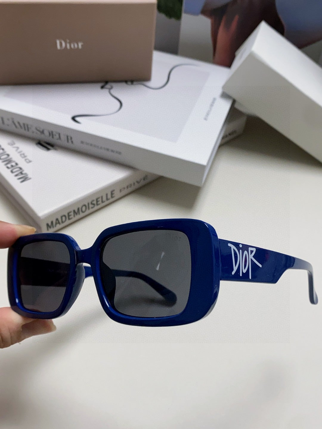 MONTAIGNE SUNGLASS 571595 IN BLUE ACETATE TEXT LOGO