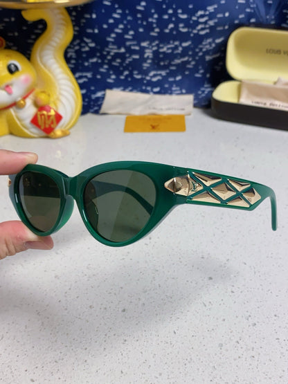 CAT EYE SUNGLASSES 576882 IN GREEN AND GOLD ACETATE