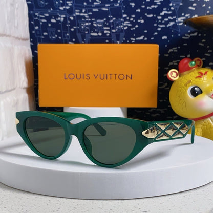 CAT EYE SUNGLASSES 576882 IN GREEN AND GOLD ACETATE