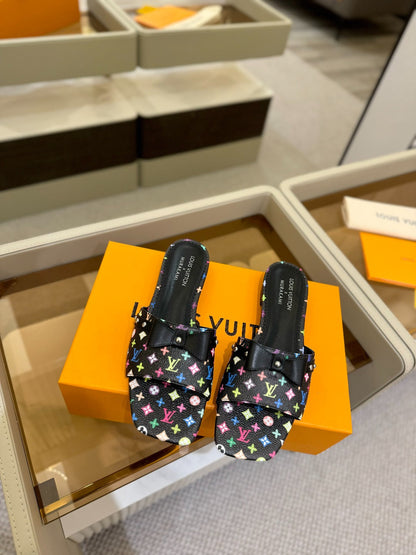 LV X TM 6AM FLAT MULE IN BLACK MONOGRAM CALFSKIN