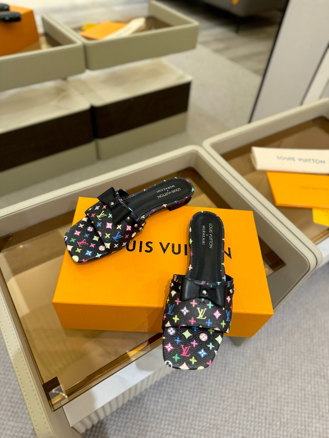 LV X TM 6AM FLAT MULE IN BLACK MONOGRAM CALFSKIN