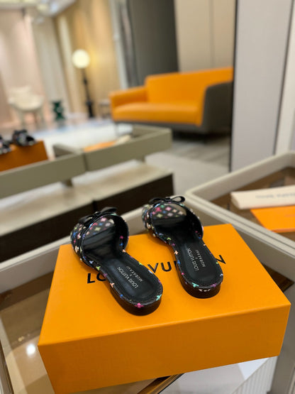 LV X TM 6AM FLAT MULE IN BLACK MONOGRAM CALFSKIN