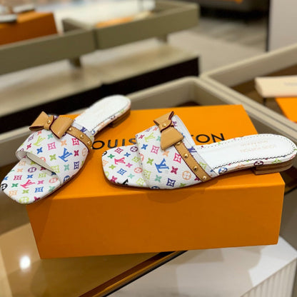 LV X TM 6AM FLAT MULE IN WHITE MONOGRAM CALFSKIN