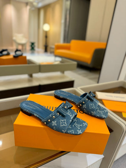 LV X TM 6AM FLAT MULE IN NAVY BLUE MONOGRAM DENIM