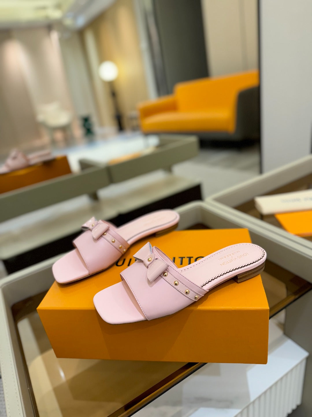 LV X TM 6AM FLAT MULE IN BABY PINK CALFSKIN