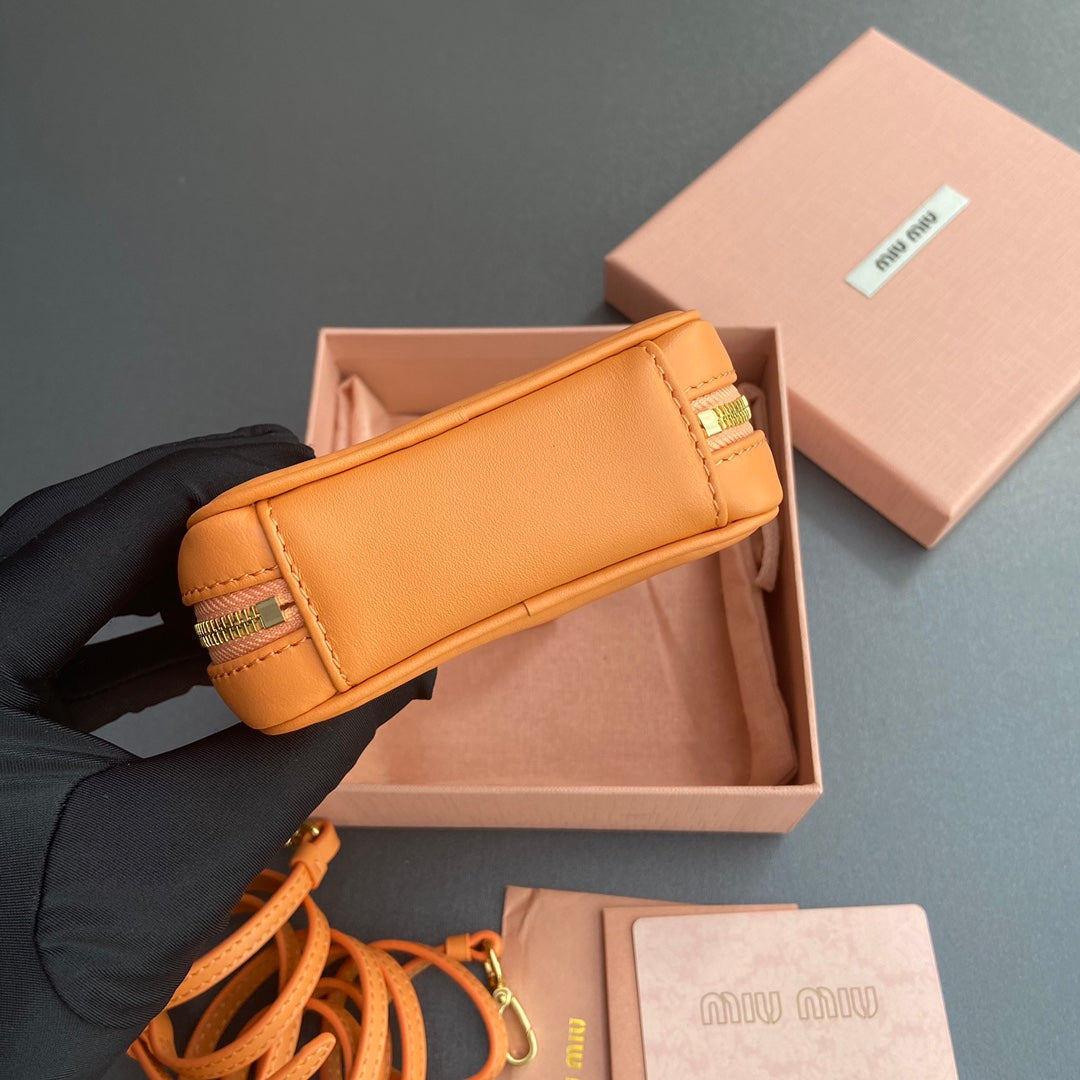 MICRO BAG KEYCHAIN 11 IN HOT CINNAMON ORANGE CALFSKIN EMBOSSED LOGO