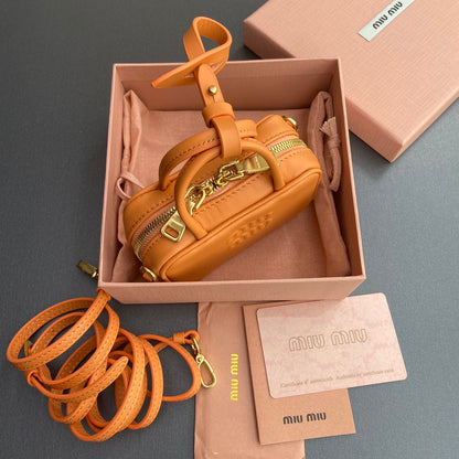 MICRO BAG KEYCHAIN 11 IN HOT CINNAMON ORANGE CALFSKIN EMBOSSED LOGO